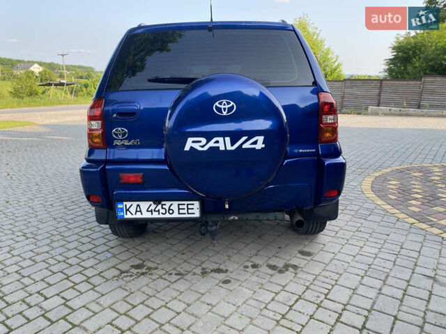 Синій Тойота РАВ 4, об'ємом двигуна 2 л та пробігом 235 тис. км за 6900 $, фото 3 на Automoto.ua