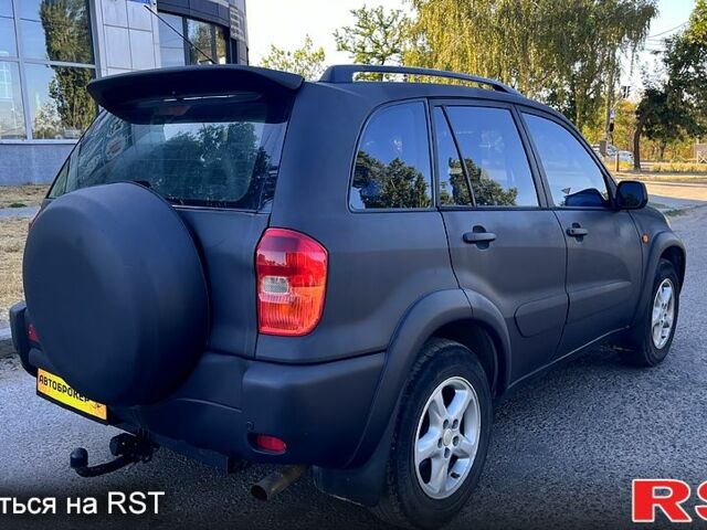 Синий Тойота РАВ 4, объемом двигателя 2 л и пробегом 268 тыс. км за 5590 $, фото 3 на Automoto.ua