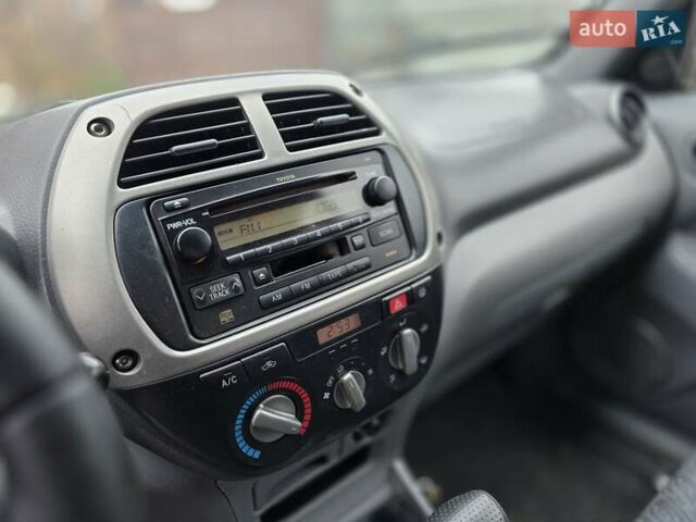 Синий Тойота РАВ 4, объемом двигателя 2 л и пробегом 135 тыс. км за 5900 $, фото 14 на Automoto.ua