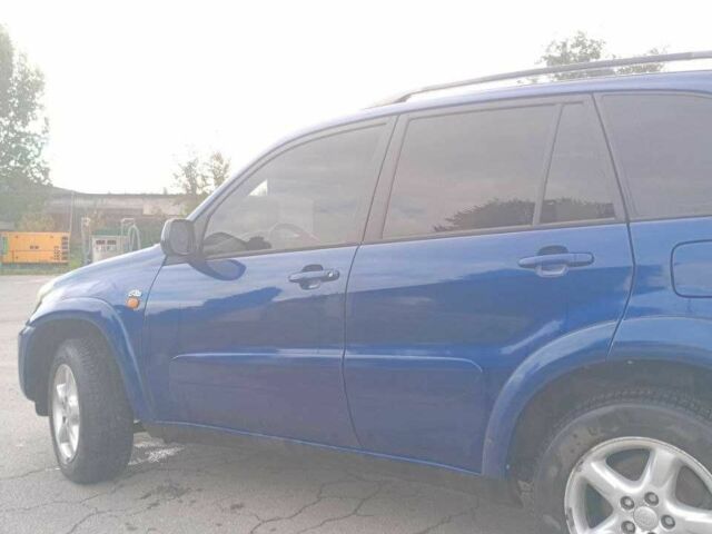 Синий Тойота РАВ 4, объемом двигателя 2 л и пробегом 280 тыс. км за 3700 $, фото 5 на Automoto.ua