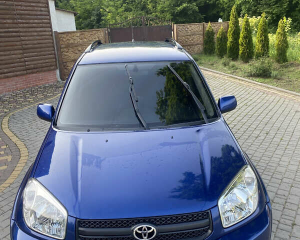 Синій Тойота РАВ 4, об'ємом двигуна 2 л та пробігом 235 тис. км за 6900 $, фото 8 на Automoto.ua