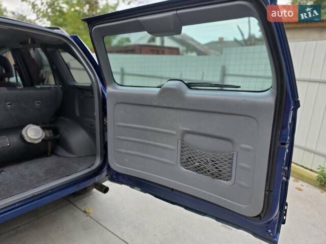Синій Тойота РАВ 4, об'ємом двигуна 2 л та пробігом 134 тис. км за 5800 $, фото 19 на Automoto.ua
