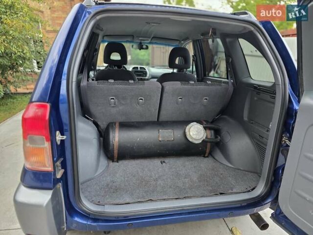 Синій Тойота РАВ 4, об'ємом двигуна 2 л та пробігом 134 тис. км за 5800 $, фото 20 на Automoto.ua