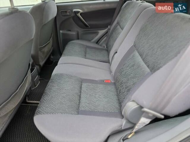 Синий Тойота РАВ 4, объемом двигателя 2 л и пробегом 134 тыс. км за 5900 $, фото 31 на Automoto.ua