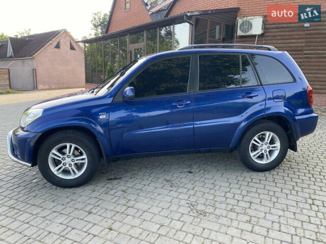 Синій Тойота РАВ 4, об'ємом двигуна 2 л та пробігом 235 тис. км за 6900 $, фото 1 на Automoto.ua