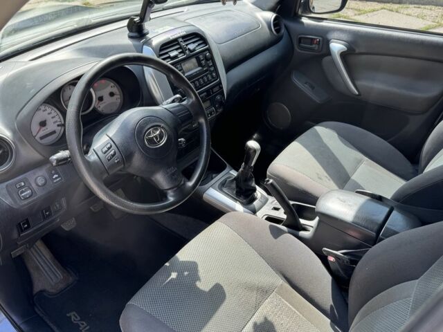 Синій Тойота РАВ 4, об'ємом двигуна 2 л та пробігом 245 тис. км за 2900 $, фото 6 на Automoto.ua