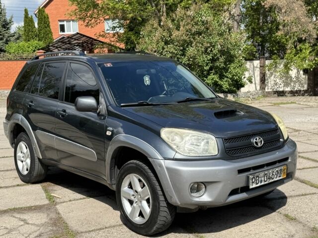 Синій Тойота РАВ 4, об'ємом двигуна 2 л та пробігом 245 тис. км за 2900 $, фото 2 на Automoto.ua