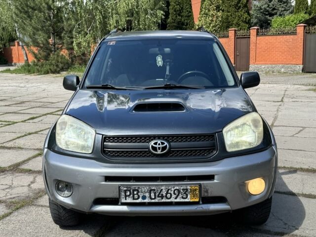 Синій Тойота РАВ 4, об'ємом двигуна 2 л та пробігом 245 тис. км за 2900 $, фото 1 на Automoto.ua