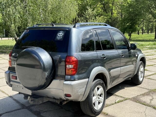 Синій Тойота РАВ 4, об'ємом двигуна 2 л та пробігом 245 тис. км за 2900 $, фото 3 на Automoto.ua