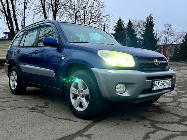 Синій Тойота РАВ 4, об'ємом двигуна 2 л та пробігом 278 тис. км за 6300 $, фото 2 на Automoto.ua