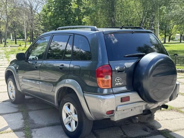 Синій Тойота РАВ 4, об'ємом двигуна 2 л та пробігом 245 тис. км за 2900 $, фото 5 на Automoto.ua