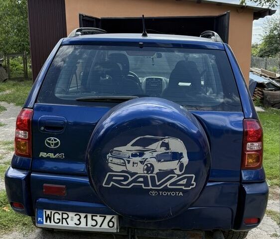 Синий Тойота РАВ 4, объемом двигателя 2 л и пробегом 332 тыс. км за 4000 $, фото 4 на Automoto.ua