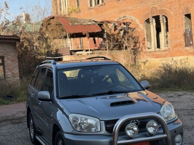 Синий Тойота РАВ 4, объемом двигателя 2 л и пробегом 313 тыс. км за 4350 $, фото 4 на Automoto.ua