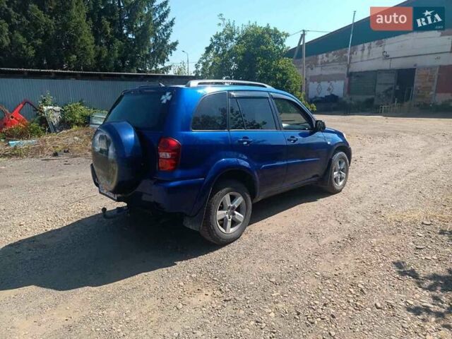 Синий Тойота РАВ 4, объемом двигателя 2 л и пробегом 400 тыс. км за 6700 $, фото 4 на Automoto.ua