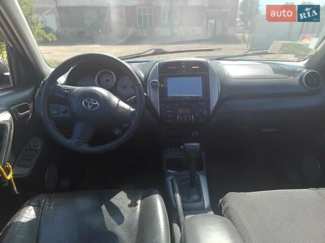 Синий Тойота РАВ 4, объемом двигателя 2 л и пробегом 400 тыс. км за 6700 $, фото 5 на Automoto.ua
