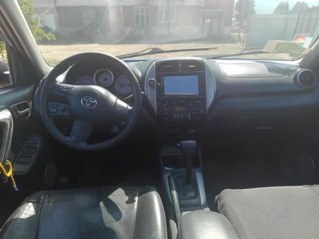 Синий Тойота РАВ 4, объемом двигателя 2 л и пробегом 320 тыс. км за 3400 $, фото 5 на Automoto.ua