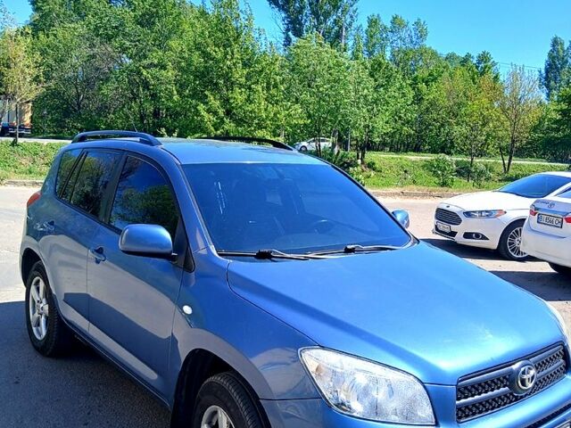 Синій Тойота РАВ 4, об'ємом двигуна 2 л та пробігом 172 тис. км за 8300 $, фото 5 на Automoto.ua