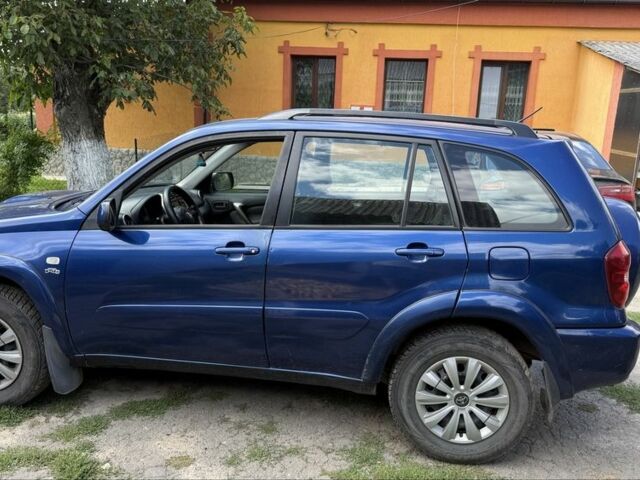 Синий Тойота РАВ 4, объемом двигателя 2 л и пробегом 332 тыс. км за 4000 $, фото 2 на Automoto.ua