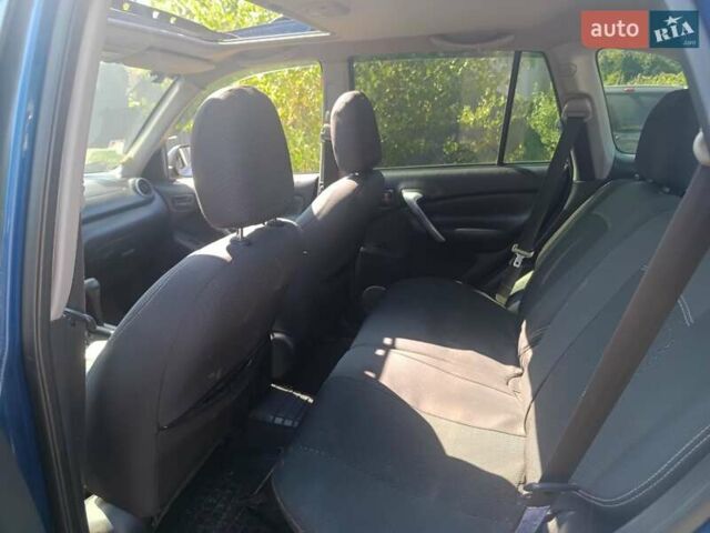 Синий Тойота РАВ 4, объемом двигателя 2 л и пробегом 400 тыс. км за 6700 $, фото 2 на Automoto.ua