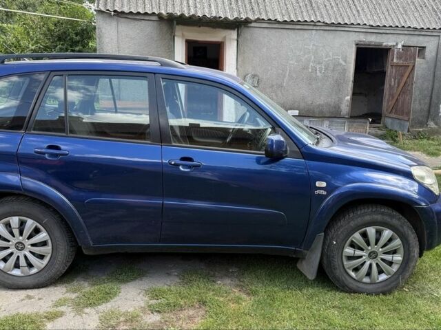 Синий Тойота РАВ 4, объемом двигателя 2 л и пробегом 332 тыс. км за 4000 $, фото 3 на Automoto.ua