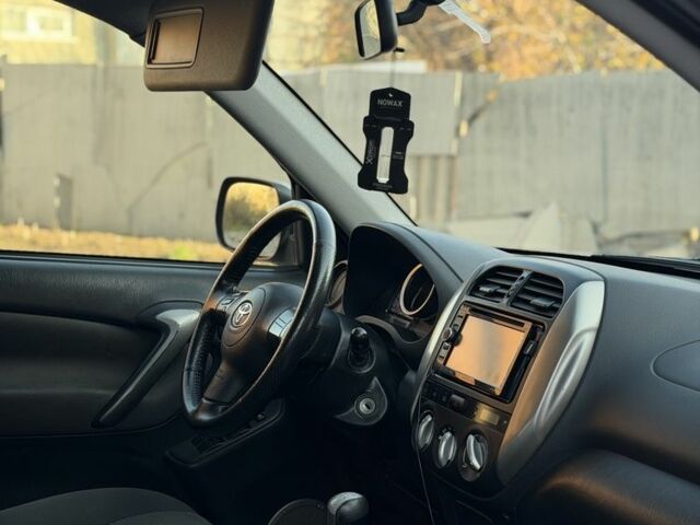 Синий Тойота РАВ 4, объемом двигателя 2 л и пробегом 313 тыс. км за 4350 $, фото 10 на Automoto.ua