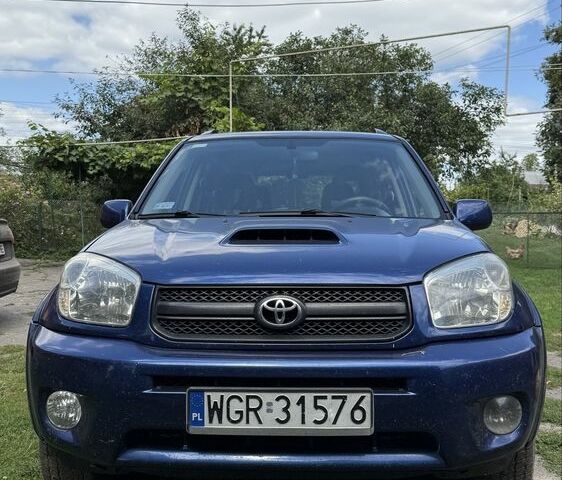 Синий Тойота РАВ 4, объемом двигателя 2 л и пробегом 332 тыс. км за 4000 $, фото 1 на Automoto.ua