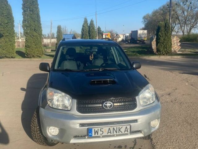 Синий Тойота РАВ 4, объемом двигателя 2.2 л и пробегом 237 тыс. км за 4500 $, фото 5 на Automoto.ua