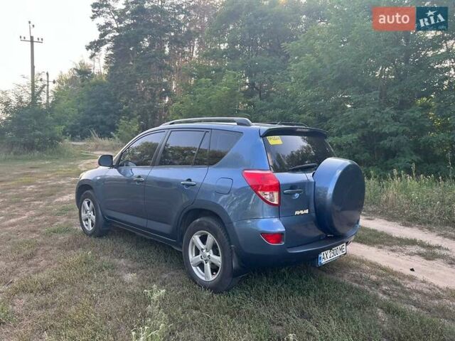Синій Тойота РАВ 4, об'ємом двигуна 2 л та пробігом 236 тис. км за 8800 $, фото 5 на Automoto.ua