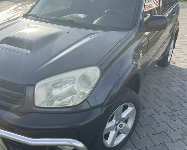 Синий Тойота РАВ 4, объемом двигателя 2 л и пробегом 350 тыс. км за 6500 $, фото 1 на Automoto.ua