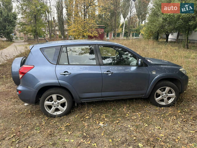 Синий Тойота РАВ 4, объемом двигателя 2.23 л и пробегом 253 тыс. км за 9500 $, фото 3 на Automoto.ua