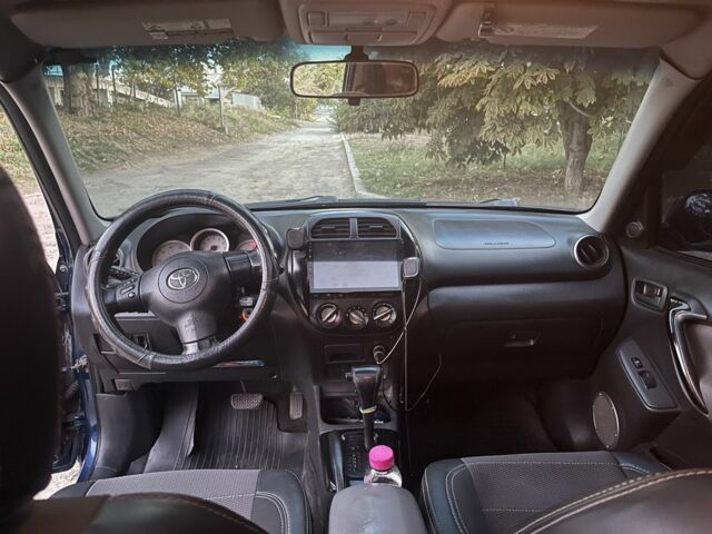 Синий Тойота РАВ 4, объемом двигателя 2 л и пробегом 250 тыс. км за 6133 $, фото 10 на Automoto.ua