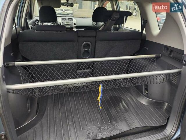 Синий Тойота РАВ 4, объемом двигателя 2 л и пробегом 168 тыс. км за 9800 $, фото 5 на Automoto.ua