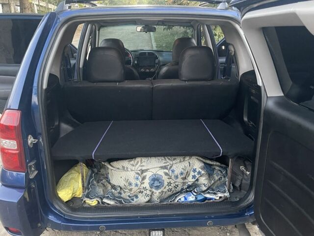 Синий Тойота РАВ 4, объемом двигателя 2 л и пробегом 250 тыс. км за 6133 $, фото 6 на Automoto.ua