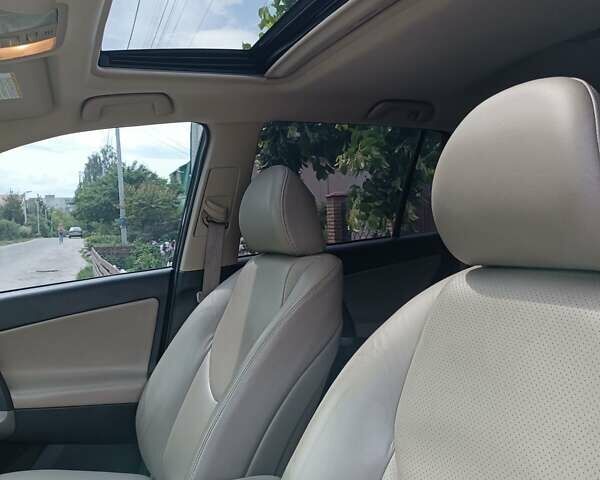 Синій Тойота РАВ 4, об'ємом двигуна 2.2 л та пробігом 260 тис. км за 9000 $, фото 13 на Automoto.ua