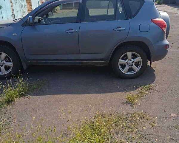 Синий Тойота РАВ 4, объемом двигателя 2 л и пробегом 400 тыс. км за 4820 $, фото 6 на Automoto.ua