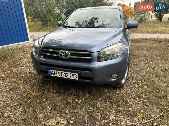 Синий Тойота РАВ 4, объемом двигателя 2.23 л и пробегом 253 тыс. км за 9500 $, фото 1 на Automoto.ua