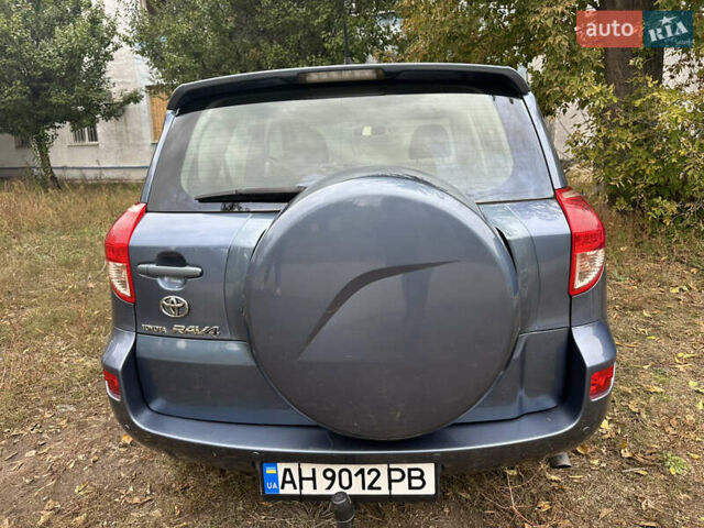 Синий Тойота РАВ 4, объемом двигателя 2.23 л и пробегом 253 тыс. км за 9500 $, фото 4 на Automoto.ua