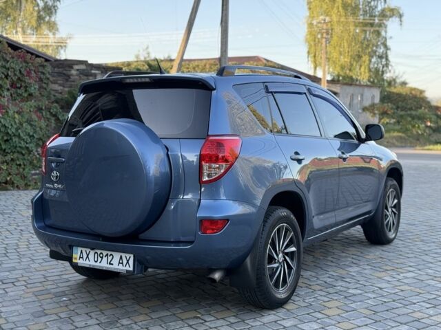 Синий Тойота РАВ 4, объемом двигателя 2 л и пробегом 124 тыс. км за 12000 $, фото 4 на Automoto.ua