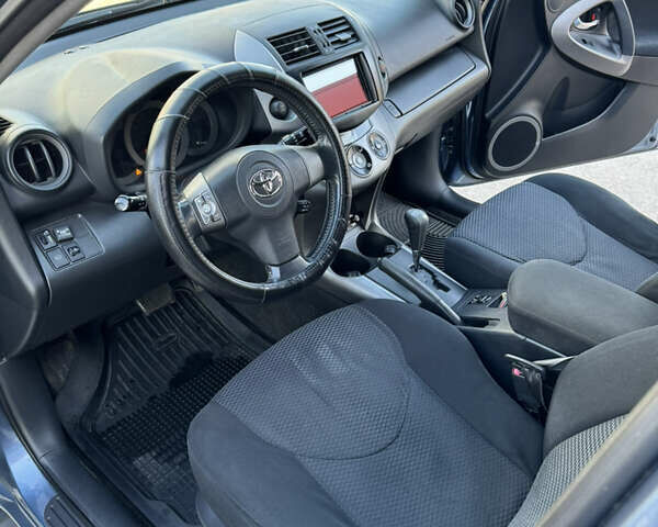 Синій Тойота РАВ 4, об'ємом двигуна 2 л та пробігом 187 тис. км за 7700 $, фото 12 на Automoto.ua