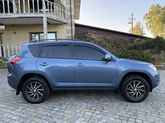 Синий Тойота РАВ 4, объемом двигателя 2 л и пробегом 124 тыс. км за 12000 $, фото 3 на Automoto.ua