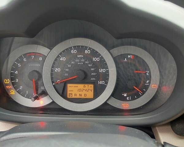 Синий Тойота РАВ 4, объемом двигателя 2.36 л и пробегом 102 тыс. км за 10000 $, фото 4 на Automoto.ua