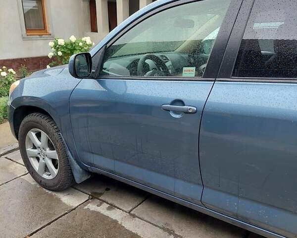 Синий Тойота РАВ 4, объемом двигателя 2.36 л и пробегом 102 тыс. км за 10000 $, фото 19 на Automoto.ua