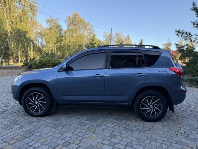 Синий Тойота РАВ 4, объемом двигателя 2 л и пробегом 124 тыс. км за 12000 $, фото 7 на Automoto.ua