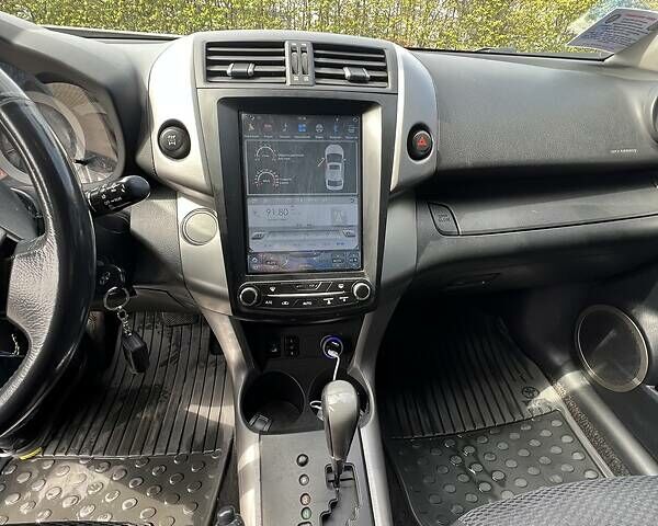 Синий Тойота РАВ 4, объемом двигателя 2 л и пробегом 278 тыс. км за 9500 $, фото 4 на Automoto.ua