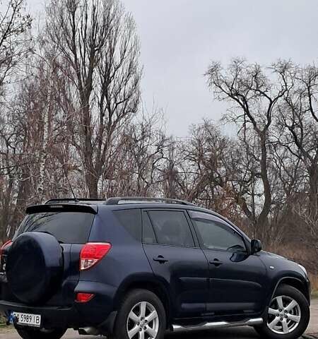 Синий Тойота РАВ 4, объемом двигателя 2 л и пробегом 239 тыс. км за 8800 $, фото 6 на Automoto.ua