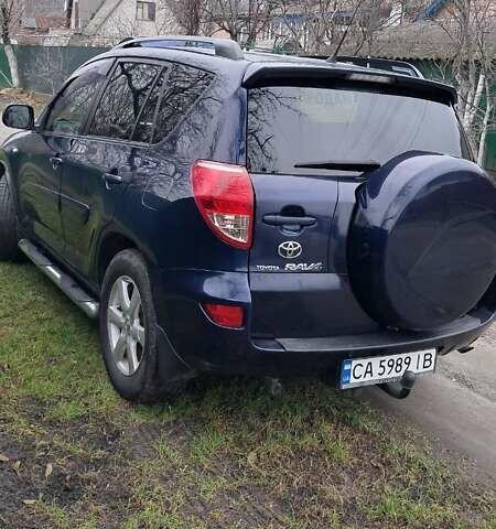 Синий Тойота РАВ 4, объемом двигателя 2 л и пробегом 239 тыс. км за 8800 $, фото 2 на Automoto.ua