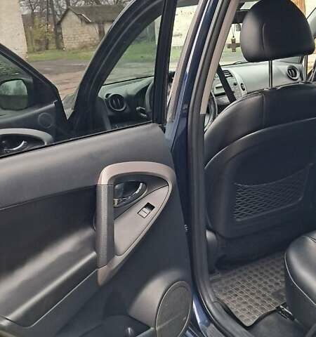 Синий Тойота РАВ 4, объемом двигателя 2 л и пробегом 239 тыс. км за 8800 $, фото 11 на Automoto.ua