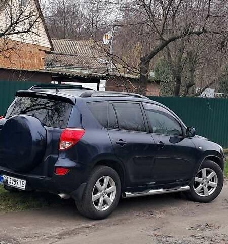 Синий Тойота РАВ 4, объемом двигателя 2 л и пробегом 239 тыс. км за 8800 $, фото 1 на Automoto.ua