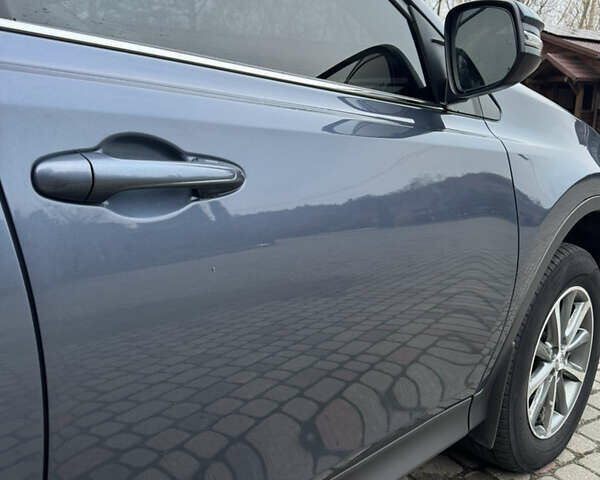 Синій Тойота РАВ 4, об'ємом двигуна 2.23 л та пробігом 146 тис. км за 18900 $, фото 13 на Automoto.ua