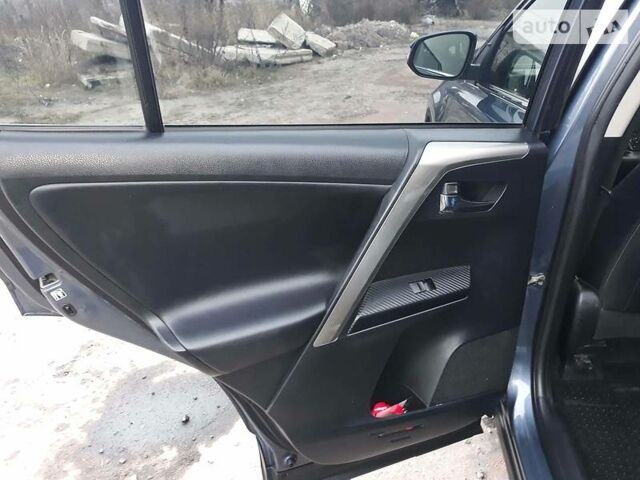 Синій Тойота РАВ 4, об'ємом двигуна 2 л та пробігом 253 тис. км за 16500 $, фото 19 на Automoto.ua